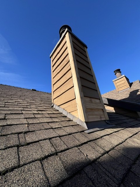 Finished chimney siding and exterior trim detail